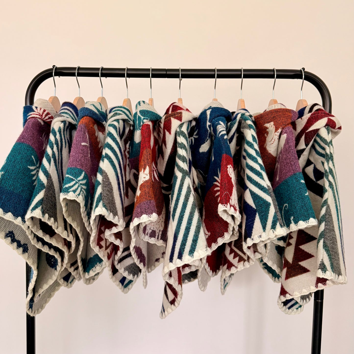 Rack showing different ponchos